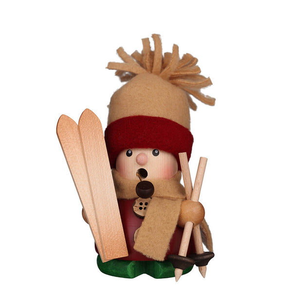 Christian Ulbricht Smoker Skier holding skis and poles, hand carved wooden incense smoker made in the Erzgebirge region of Germany