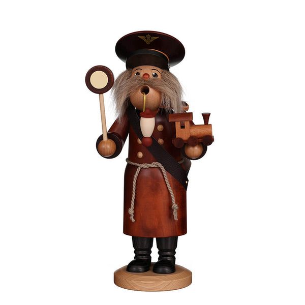 Hand-carved wooden incense smoker figurine dressed as a train conductor, holding a small model train, with a cone inserted at the top.