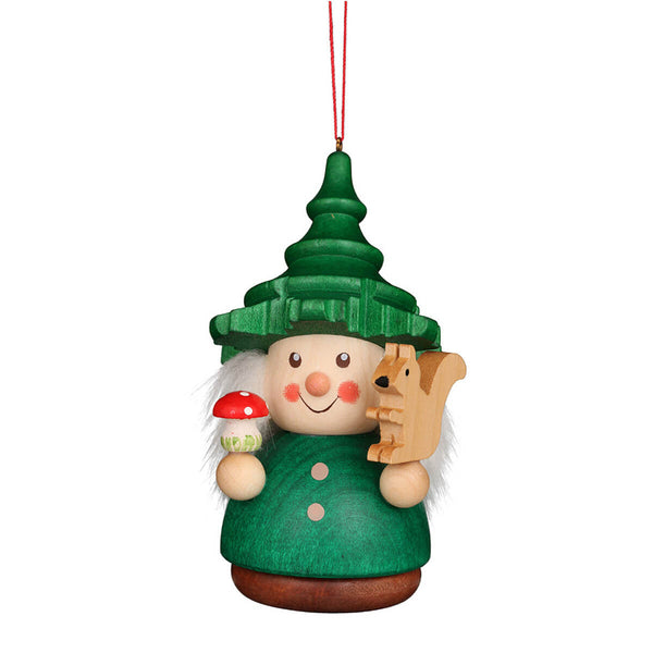 A green hat and a green jacket. This little wobble figure looks like a pine tree. In one hand he holds a squirrel in the other a toadstool.