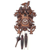 Leaves frame a Traditional Engstler Cuckoo Clock with carved Birds on Top and in a Nest on the bottom