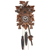 Five Ivy Leaves frame a Traditional Engstler Black Forest Cuckoo Clock with an ornate carved Bird on Top