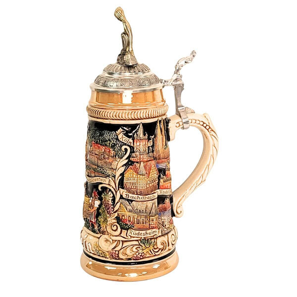 side of German beer stein with Loreley figurine lid, Rhine River panorama, castles, vineyard scene, white ship, and historic cities Koeln, Bacharach, Kaub/Pfalz, Ruedeshaeim