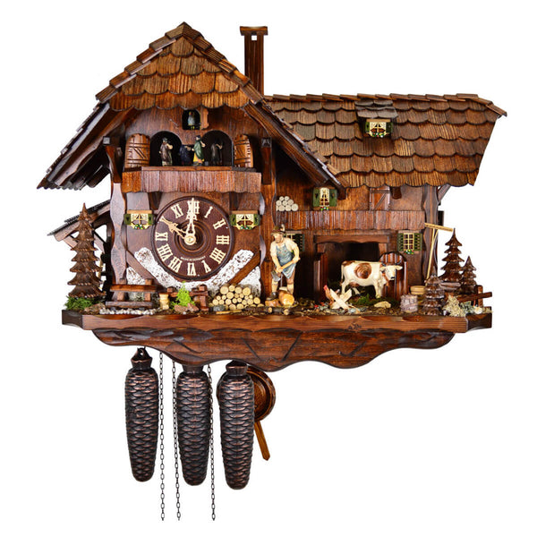 Traditional Black Forest cuckoo clock handmade in Germany with chalet design.