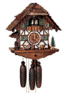 8-Day Schneider Chalet coocoo clock with music. The half-timbered chalet is white with dark wood on the upper half. Next to a green fir tree a little dog with a keg around his neck watches a man chopping wood to the right of the dial. Another wood chopper saws wood, a pile of firewood is stacked behind him. There is a water wheel on the left underneath a little overhang, The dancers spin on the balcony. The cuckoo comes out behind his door above the dancers. The roof is made of wooden shingles.