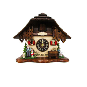 This quartz tabletop Cuckoo Clock by Engstler features Heidi's Chalet as the setting, making it a charming and unique authentic piece from the Black Forest. With Heidi, Grandfather and their dog standing on the left of their chalet and Peter and his goat on the right corner, this clock is full of detail. It features a bench by the clock dial, windows with red shutters and flower boxes, dark wood paneling on the upper level and a “Heidi's Chalet” plaque. 
