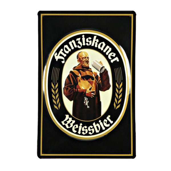 Vintage metal sign for Franziskaner Weissbier, depicting a smiling Franciscan monk enjoying a mug of Weissbier.