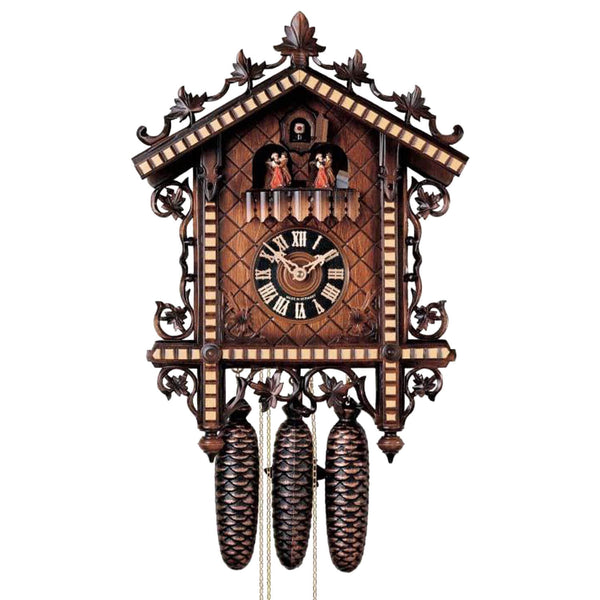 Hönes 8-day Station House cuckoo clock with carved ivy scrollwork, dark and light wood tones, and spinning dancers. Handmade in the Black Forest, Germany.