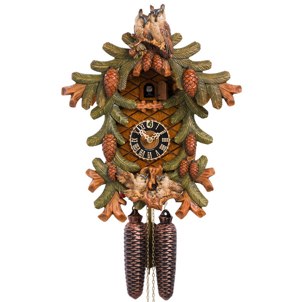 Hönes 8-day Black Forest cuckoo clock with handpainted owls, pinecones, and carved forest detailing. Authentic handcrafted German clock.
