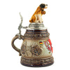 The side of theKing Beer Stein is painted in various shades of brown and has a decorative Edelweiss ornament. On the pewter lid sits a St. Bernard, one of the famous Swiss dog breeds.