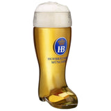 A half Liter Glass Boot with the typical blue Hofbräuhaus Logo in the front Center and the words Hofbräuhaus München underneath. This Beer Boot is filled with a nice cold Beer and has a perfect Foam crown.