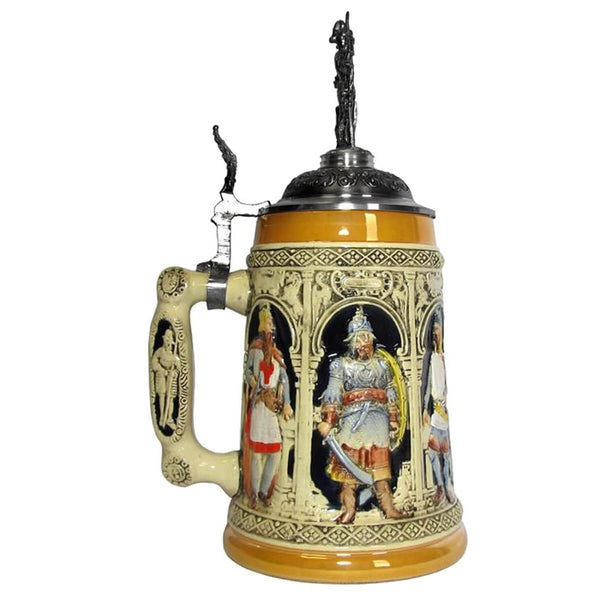 The side of a KING beer stein with different knights - belonging to the crusaders. the nicely decorated handle shows more knights. On top of the Lid is a pewter knight.