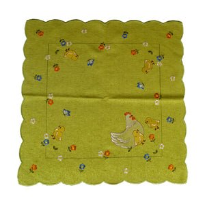 Square green table linen with scalloped edges, and a border design of a hen with chicks, butterflies, and flowers.