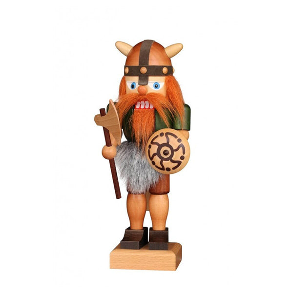 Handcrafted Christian Ulbricht Viking nutcracker with red hair, a battle axe, and a rune-decorated shield, ready for battle.