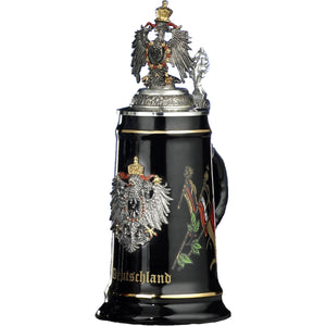 Black impressive Beer Stein with pewter Eagle on the front. The eagle is framed by waving flags and the inscription Germany in golden curved letters. A proud pewter eagle decorated with red and gold paint sits on the pewter lid and completes the overall image.