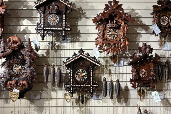 Wall of black forest cuckoo clocks VdS certified