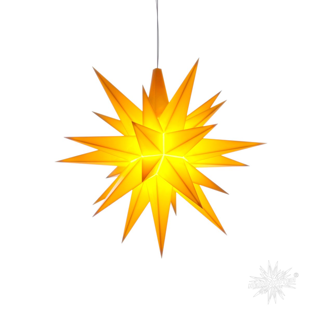 Yellow Herrnhuter Moravian star A1e shines festively
