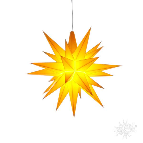 Yellow Herrnhuter Moravian star A1e shines festively