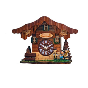 Miniature battery operated cuckoo clock depicting an Alpine music barn with an oompah band playing.