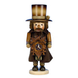 This hand carved Christian Ulbricht nutcracker is dressed in the working attire of a clock maker. He proudly holds a black forest cuckoo clock.