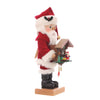 Christian Ulbricht Santa nutcracker side view showing working Black Forest cuckoo clock details, carved trees and traditional red attire