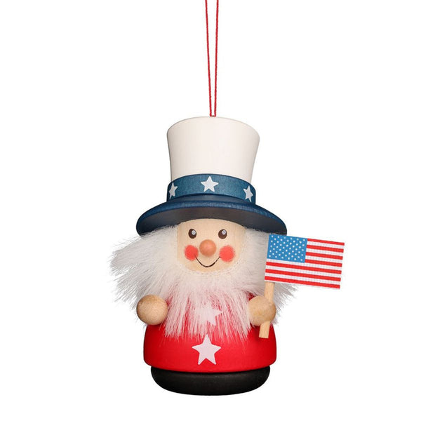 Christian Ulbricht wooden wobble figure Uncle Sam ornament holding American flag with red white and blue hat