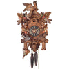 1 day traditional cuckoo clock with moving birds on the bottom above a nest, surrounded by a frame of alpine roses and a cuckoo carving on top.