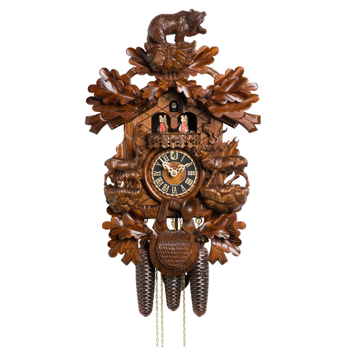 Hönes 8-day Black Forest cuckoo clock with carved bear, deer, spinning dancers, and traditional woodland design.