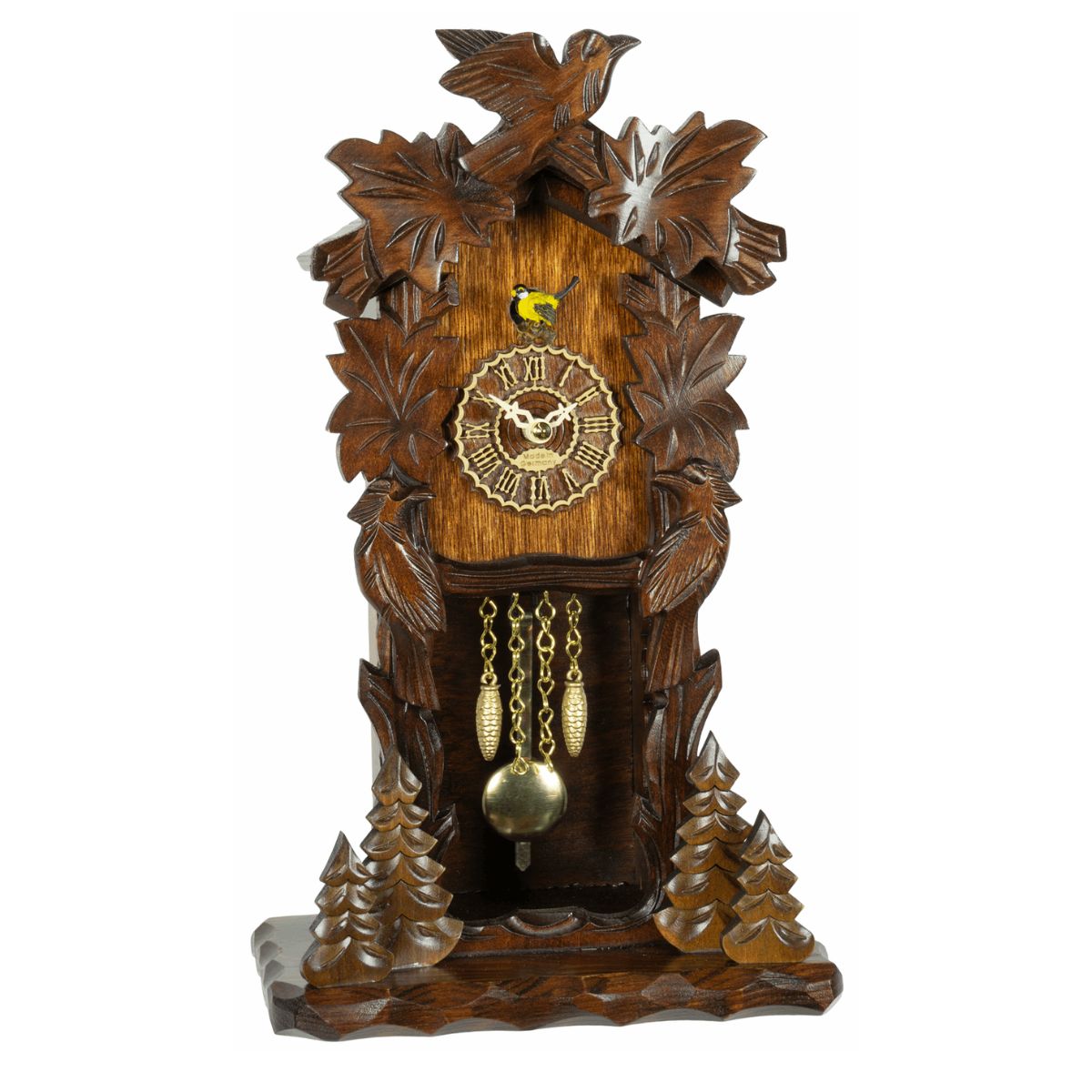 Trenkle miniature quartz cuckoo clock with carved oak leaves, handcrafted wooden moving bird above the dial, brass pendulum, and Black Forest craftsmanship.