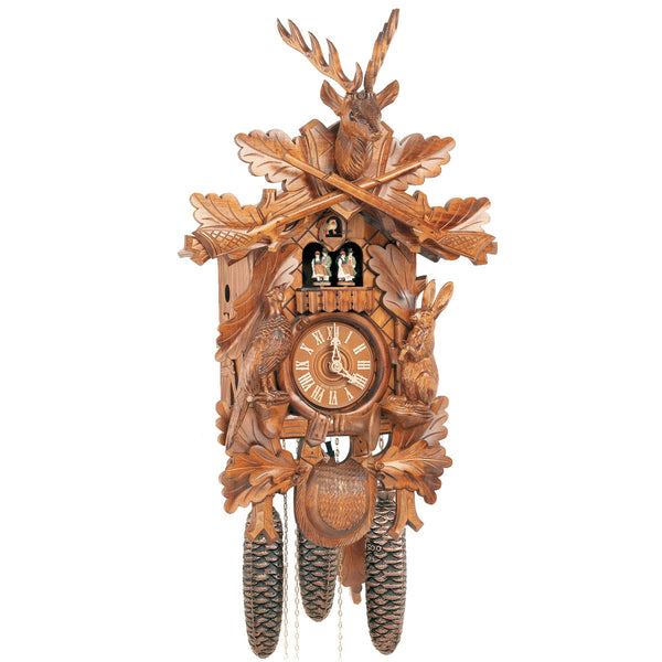 Anton Schneider 8-Day Hunter Cuckoo Clock featuring deer head, rabbit, pheasant, and hunter’s horn carvings with spinning dancers.