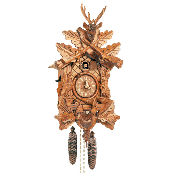 8-day Black Forest hunter cuckoo clock by Anton Schneider featuring rifles, deer, and carved woodland animals, handcrafted in Germany.