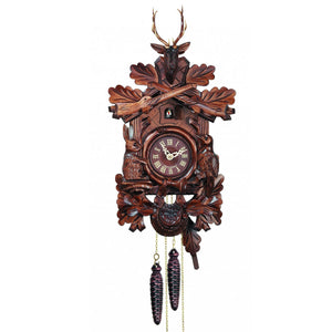 Engstler Black Forest Traditional Cuckoo Clock with a Rabbit and Bird, two Rifles and a Deer Head.