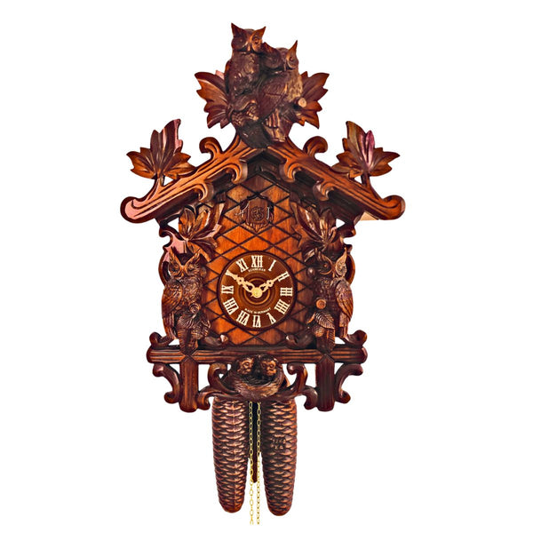 8-Day Schneider Black Forest cuckoo clock with owls, trellis, and leaf carvings.