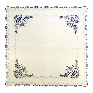 Square white linen tablecloth with Blue Onion embroidery, small blue onions around the rim and blue flowers blooming in the corners.