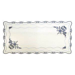 White linen table runner with Blue Onion embroidery, small blue onions around the rim and blue flowers blooming from two corners, size 16x32 inches.