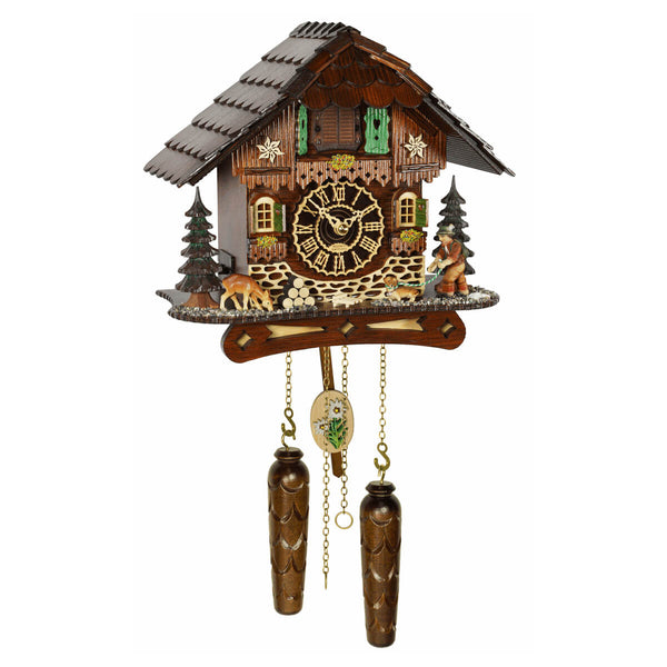 Trenkle chalet cuckoo clock with deer, dachshund, green shutters, edelweiss detail, wood weights.