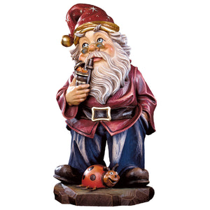 Hand-carved Boss Gnome figurine with pipe and ladybug, crafted by DEUR in South Tyrol