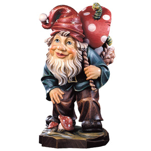 Hand-carved Mushroom Forager Gnome by DEUR carrying a toadstool with a green worm, made in South Tyrol.