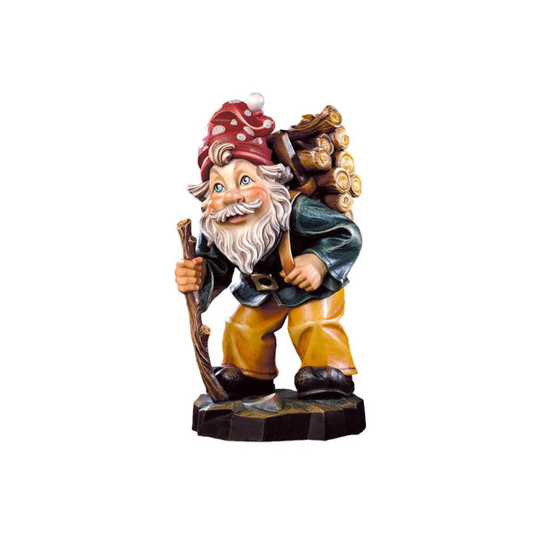Hand-carved Wood Carrier Gnome by DEUR with walking stick, log bundle, and red hat, made in South Tyrol.