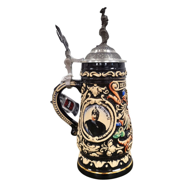 Black Beer Stein with silver accents and a portrait of Wilhelm II .The Pewter Lid is topped with a bust of Wilhelm II