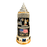 Colorful Landmarks on a dark based colored Beer Stein from KING. on the top rim are the Names of the States and on the bottom are Motifs of famous North American Wildlife. The Handle is engraved with the words "Land of the Free".