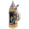 Side view of KING Fireman Beer Stein featuring ladder, axe, firefighting tools, German firefighter motto, and ornate pewter lid