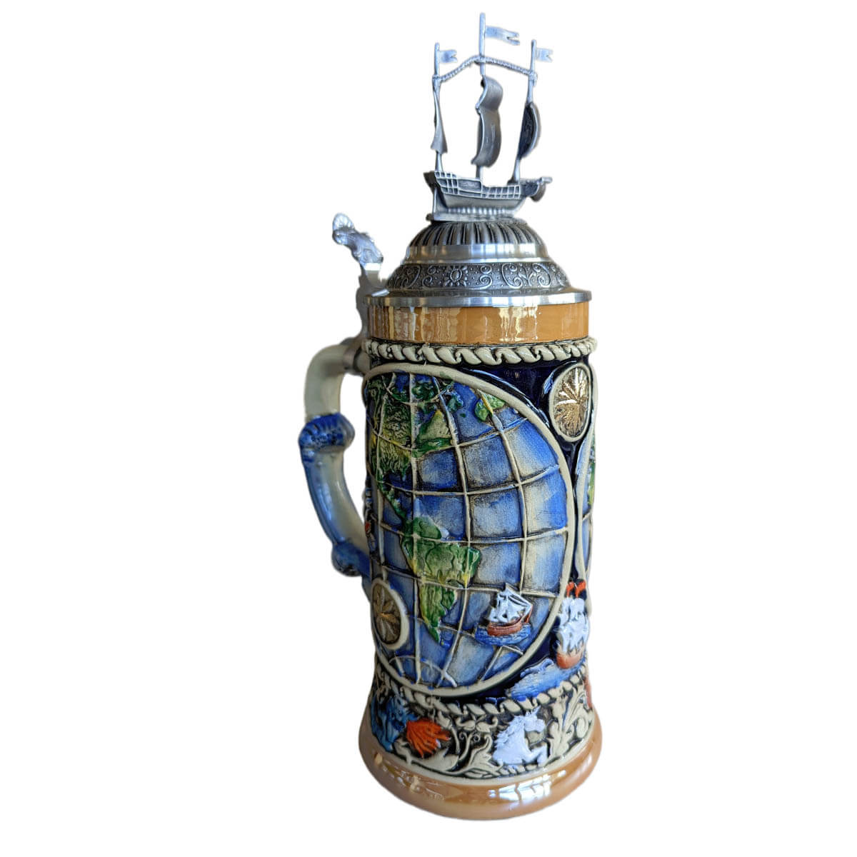 Beer Stein with an old-world map and the ships of the explorers of that time. The lower rim is decorated with signs of the four elements representing Fire, Earth, Wind and Water. The pewter lid is decorated with a globe and an imposing sailing ship.