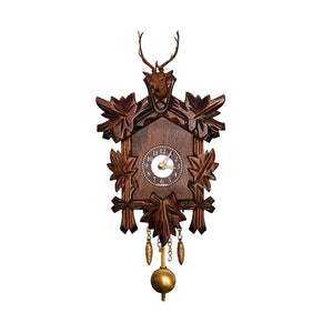 Five Ivy Leaves frame an Engstler Miniature Clock with a Stag Head with Antlers