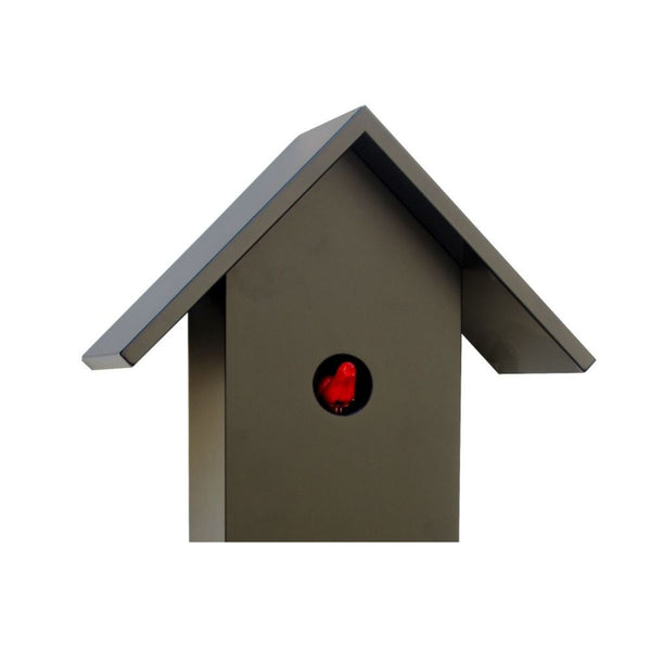 Close-up of CLASSIC black cuckoo clock showing carved cuckoo bird and sleek black finish
