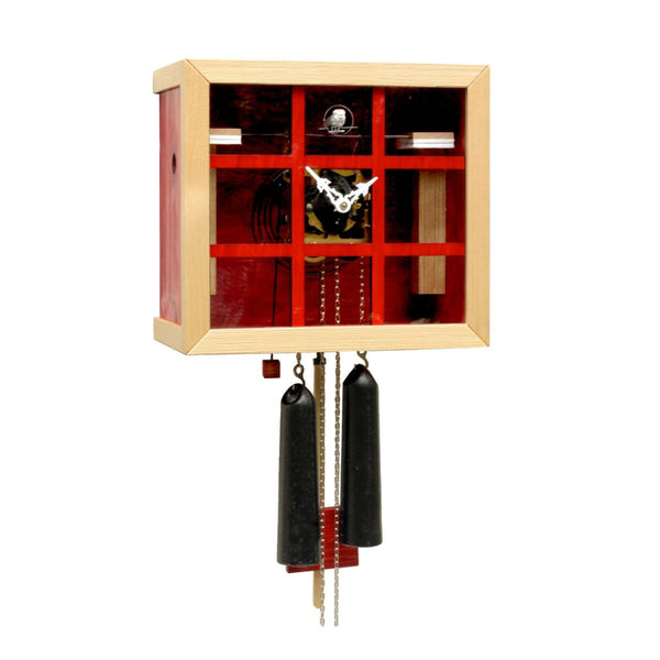Red EINBLICK modern cuckoo clock by Rombach & Haas with glass front, visible mechanical movement, handmade in the Black Forest.