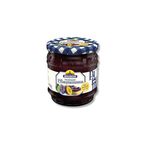 A glass jar of Mühlhäuser Thüringer Pflaumenmus plum jam