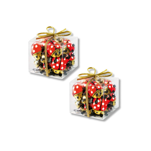 two boxes of Riegelein chocolate ladybugs.