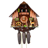8-Day Chalet Style Cuckoo Clock by August Schwer: A picturesque scene of traditional Black Forest charm, complete with a gabled roof, dancing figures, and a spinning waterwheel amidst lush greenery and a serene woodland setting
