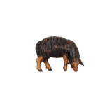 This PEMA Kostner Nativity - Sheep Black Looking Right is a beautifully hand-carved and hand-painted, black, wooden sheep, grazing and looking right. Its intricate details add to its rustic charm and make it a perfect addition to any nativity.