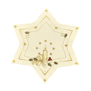 Star shaped champagne color table linen, with a center design of a lighted candle with flowers and a bow, and repeating star patterned borders.